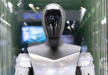 特斯拉人形机器人自己造自己,特斯拉机器人是真人吗